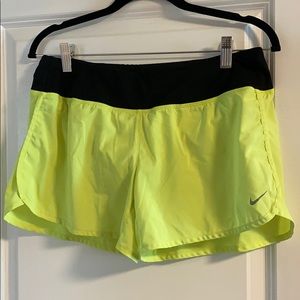 Neon yellow Nike dri fit running shorts